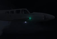Image showing a plane with a strobe light.