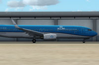 Side view of KLM Royal Dutch Airlines Boeing 737-800 on the ground.