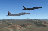 Screenshot of two McDonnell-Douglas F-15E's in flight.