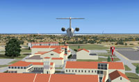 Screenshot of plane flying NAS Sigonella scenery.