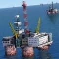Screenshot of oil rigs out in the water.