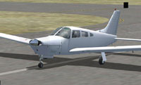 Screenshot of white Piper on runway.