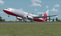 Screenshot of RedSox Dominican Airways Boeing 737-800WL on runway.