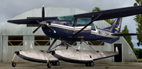 Screenshot of Regal Air Of Alaska Cessna U206G outside the hangar.