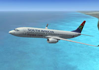 Screenshot of SAA Boeing 737-800 flying over clear blue waters.
