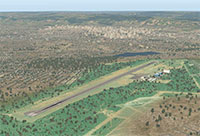 Aerial view of the airport and runway.