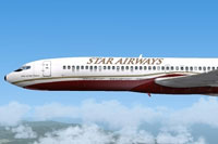 Side view of Star Airways Boeing 727-200 in a retro livery.