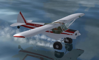 Screenshot of Super Cub Extreme2 C-FRXP skimming the surface of the water.