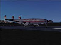 Screenshot of TWA Lockheed 1049G-82 on runway.