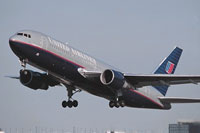 Photo of United Airlines Boeing 767-300 taking off.