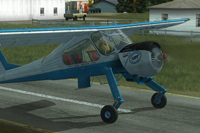 Screenshot of blue and white Wilga X on runway.