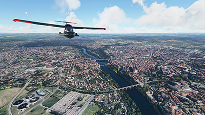 Flying over the city of Albi, France in an Icon A5 in Microsoft Flight Simulator after installing this freeware scenery mod.
