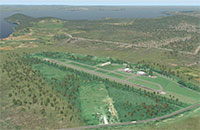 Aerial view of the airport and surrounding scenery.