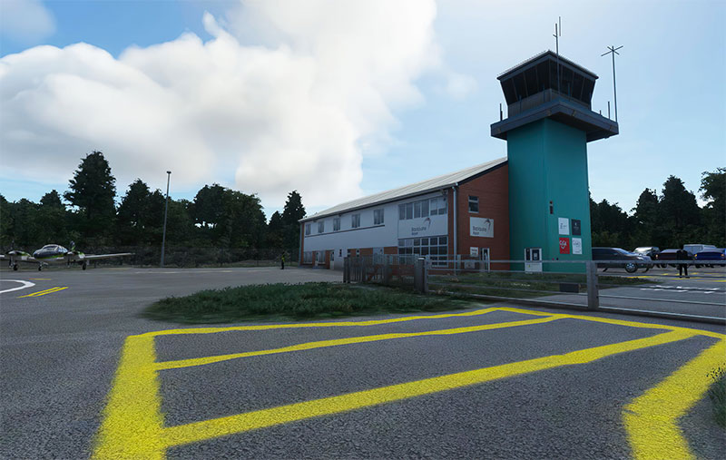 Control tower and buildings at EGLK displayed in MSFS.
