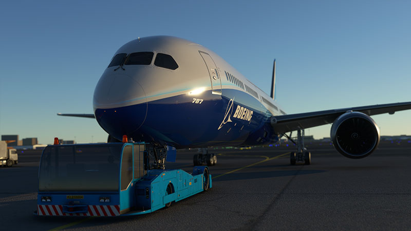 Boeing 787 with tug pushback underway.