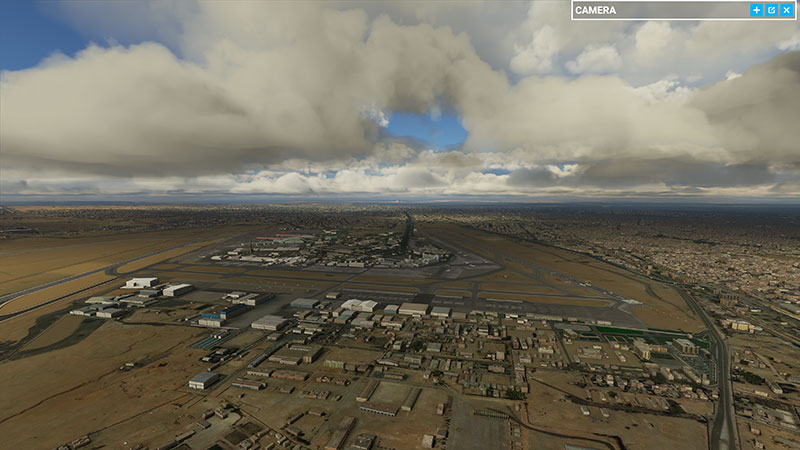 Cairo airport displayed in the sim with Pyramids visible in the far distance.