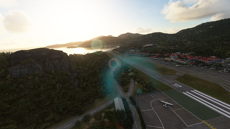 Coastal runway with end of runway at sea.