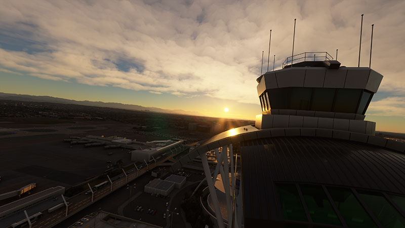 Airport control tower at sunset.