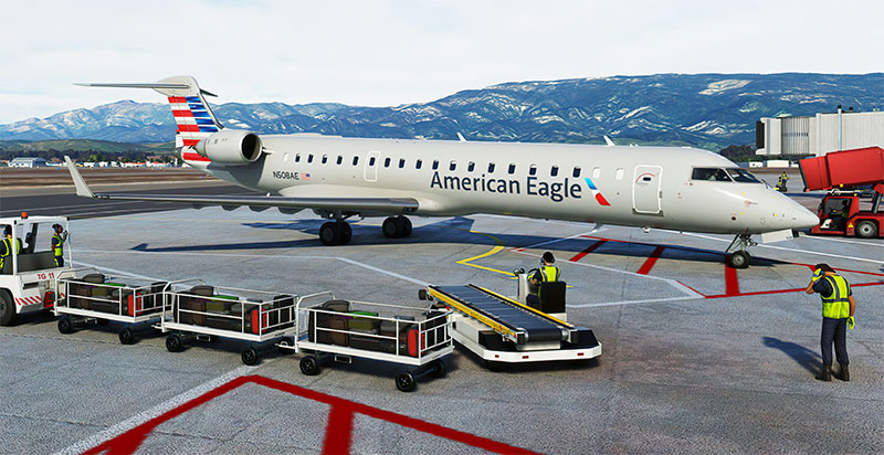 The Aerosoft CRJ550/700 on ramp with cargo being loaded in FS2020.