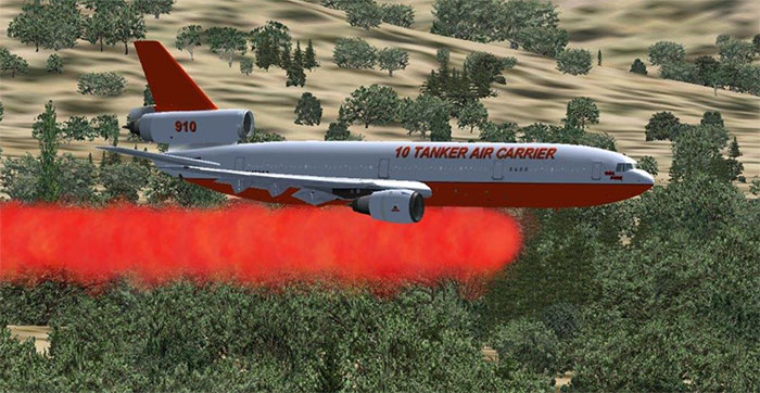 DC-10 tanker dropping its load over a wildfire.