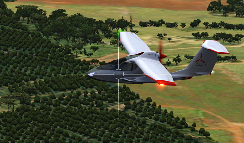 Icon A5 flying over trees.