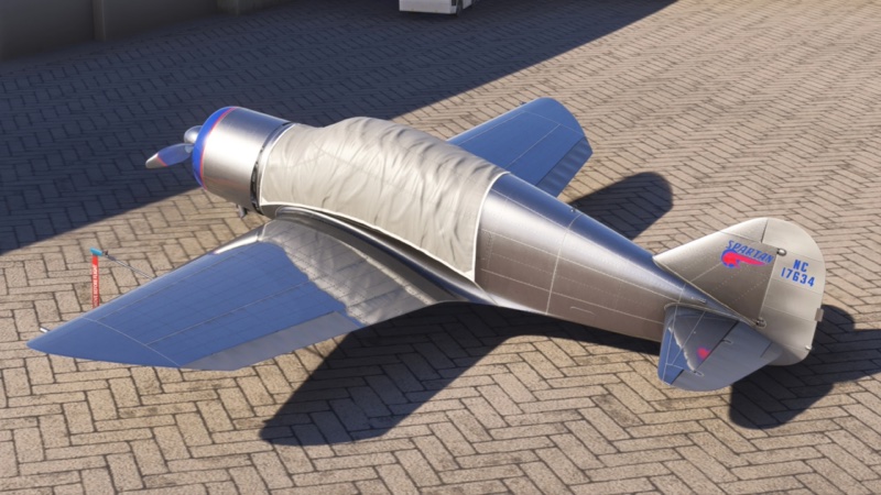 Aircraft displayed with cockpit cover draped over the aircraft while on ramp in MSFS 2024.