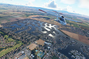 Icon A5 flying over inland lakes.