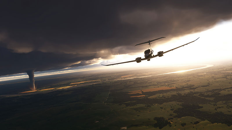 Aircraft in skies with clouds overhead.