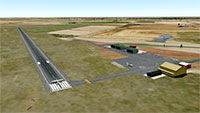 Aerial view of the runway and hangers.