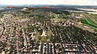 Image shows an Icon A5 flying over Reykjavic in MSFS after installing this freeware mod.