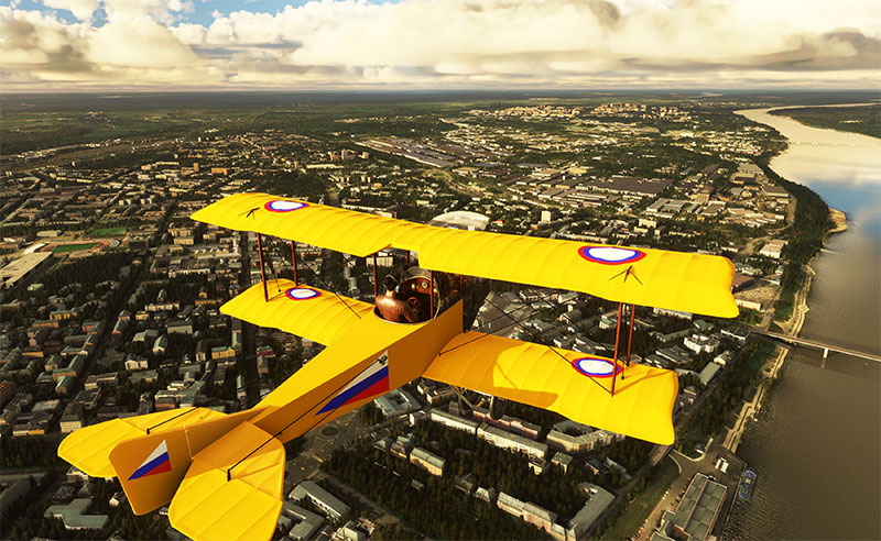 Sikorsky S-16 in flight over a river in Microsoft Flight Simulator (MSFS).