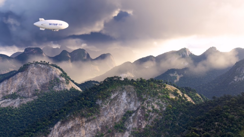 Airship (Skyship) flying towards cloudy mountains in MSFS 2024.