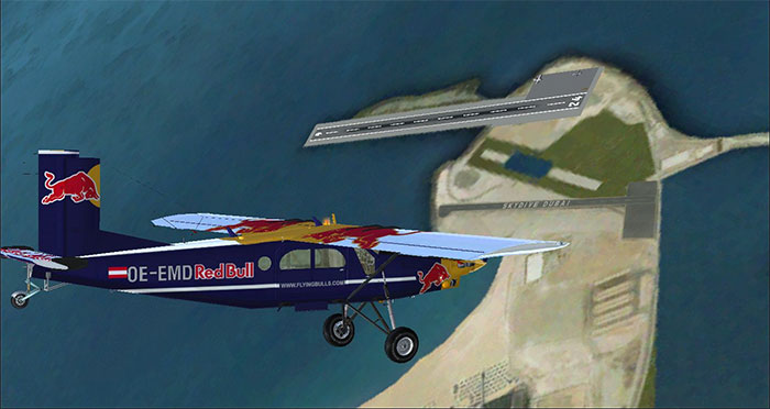 Skydive Dubai showing Red Bull aircraft and runway.