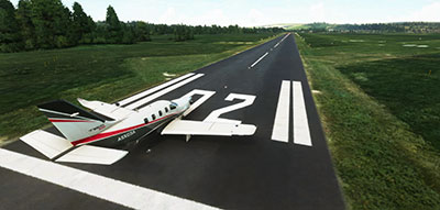 A TBM 930 on the runway ready for take-off at Shoreham/Brighton EGKA airport in Microsoft Flight Simulator (MSFS) after installing this freeware mod.