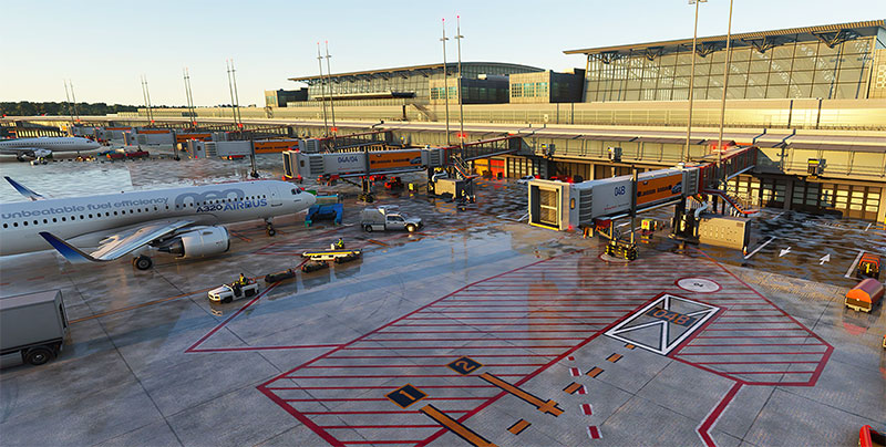 A busy terminal and aircraft gates and jetways at Hamburg in Microsoft Flight Simulator 2020.