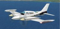 White and black Cessna 310 in flight.