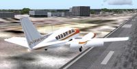 Cessna 404 Titan taking off.