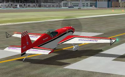 Improved Extra 300 on runway. 