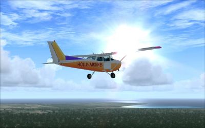 Multicolor Cessna C172 in flight.