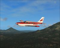 Red Saratoga II TC in flight.