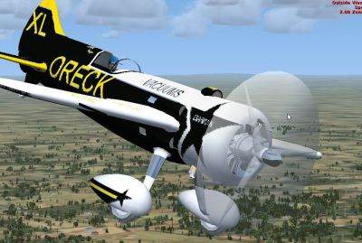 Wolf Aircraft Cyclone-Bee Gee Racer in flight. 