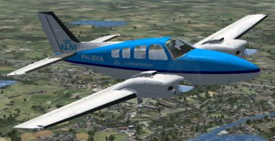 KLM Flight School Beechcraft Baron 58 in flight.