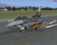 TUAF F-16D on runway.