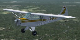White and yellow Piper PA-18 Super Cub in flight.