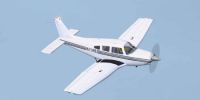 Piper Cheroke Arrow III Turbo in flight.