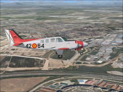 Spain Air Force Beech Baron 58 in flight.