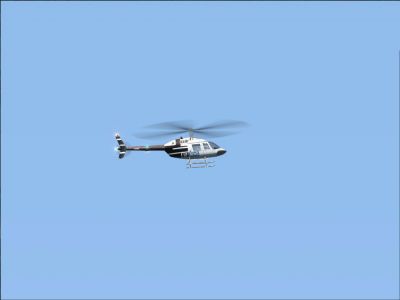 Bell 206 in flight.