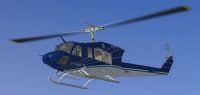Bell 212 in flight.