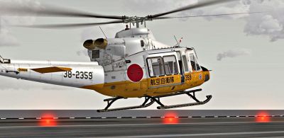 Japan Air Self-Defense Force Bell 412 taking off.