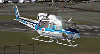 Japan Coast Guard Bell 212 in flight.